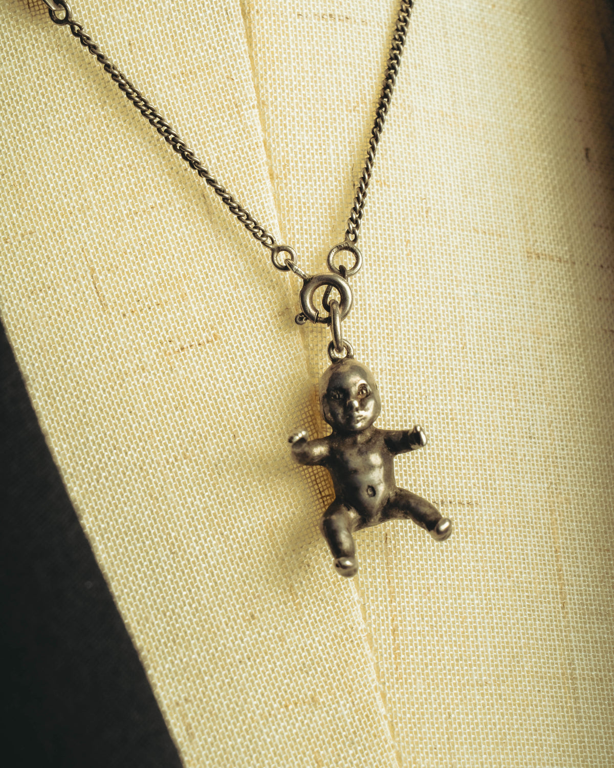 "Saint Laurent" 10's-20's Sculptural doll pendant necklace
