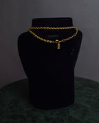 "YVES SAINT LAURENT" Embossed medallion YSL charm necklace