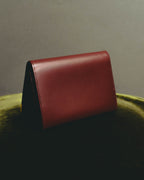 “Cartier” 90’s Must de Cartier burgundy embossed leather bifold wallet