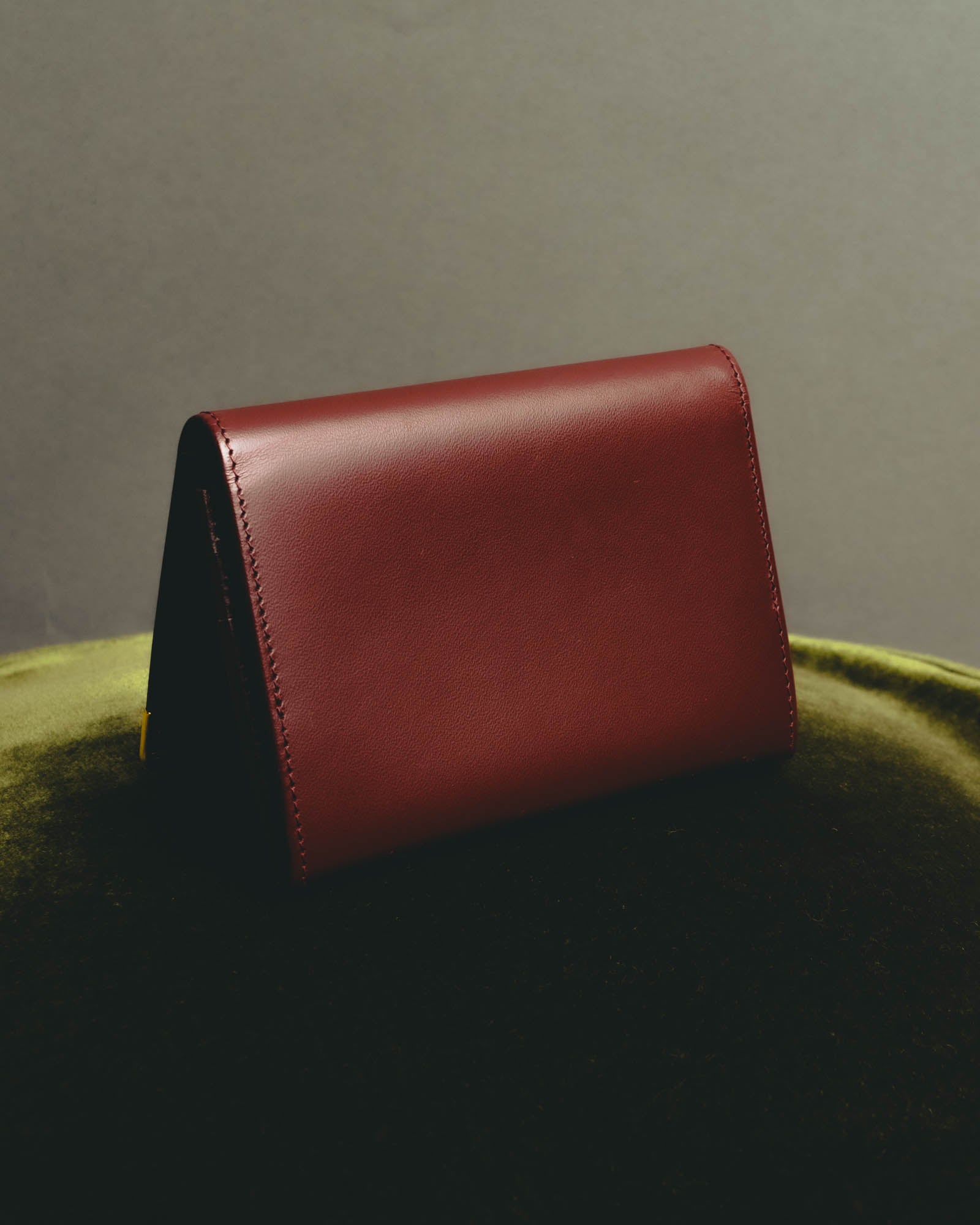 “Cartier” 90’s Must de Cartier burgundy embossed leather bifold wallet