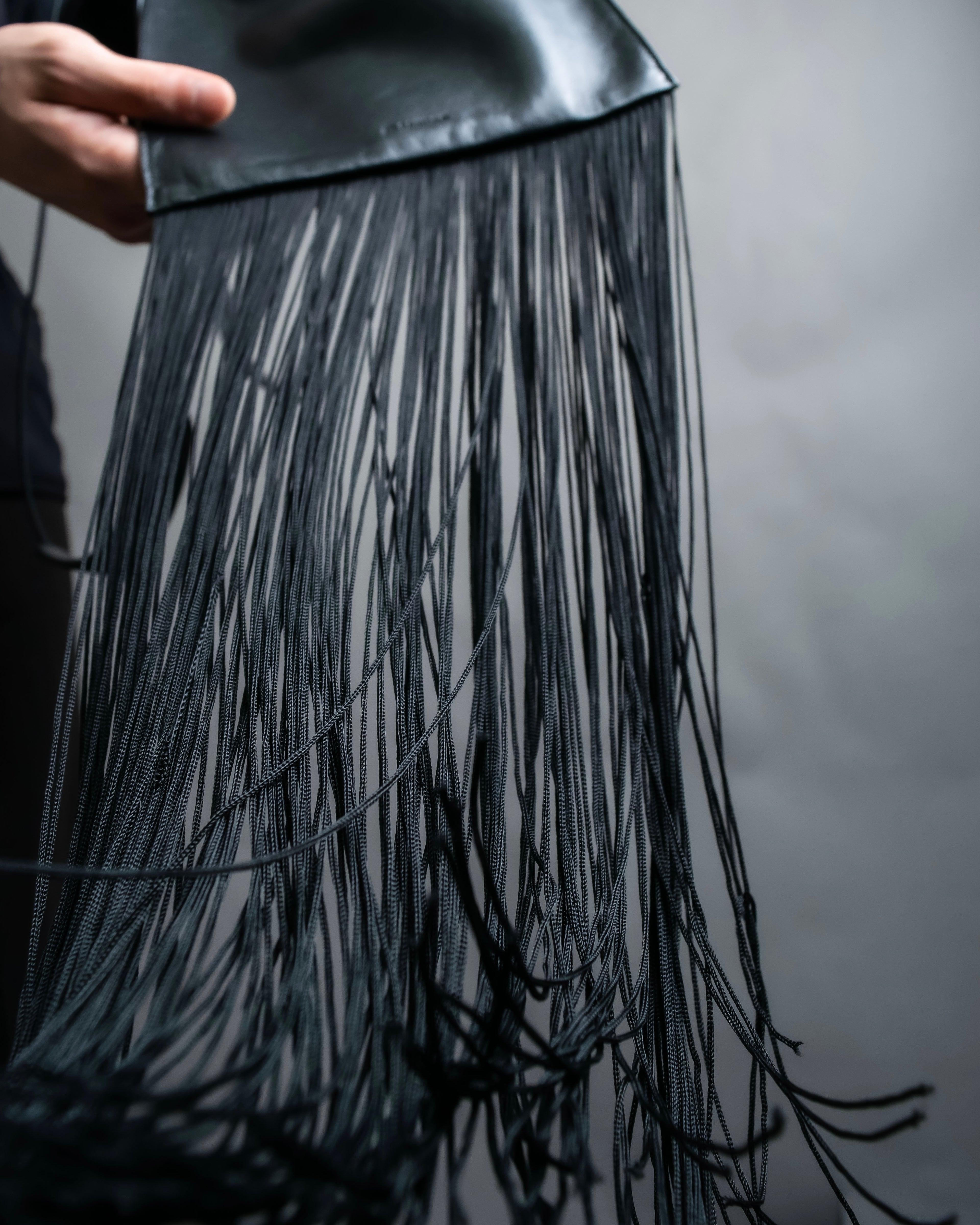 “JIL SANDER” Fringe detail flat drawstring shoulder bag