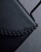 "YVES SAINT LAURENT" Hand stitched design trapezoid leather bag