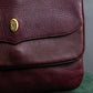 "Cartier" Texture changing bordeaux colored leather shoulder bag