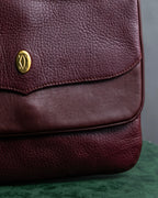 "Cartier" Texture changing bordeaux colored leather shoulder bag