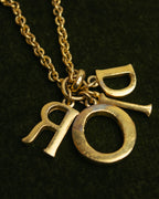 "Christian Dior" 90's-00's Gold tone logo charm necklace