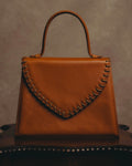 "Yves Saint Laurent" 70's-80's Cognac leather top handle bag