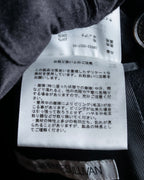 "JOHN LAWRENCE SULLIVAN"
 Large lapel double-breasted mid length coat