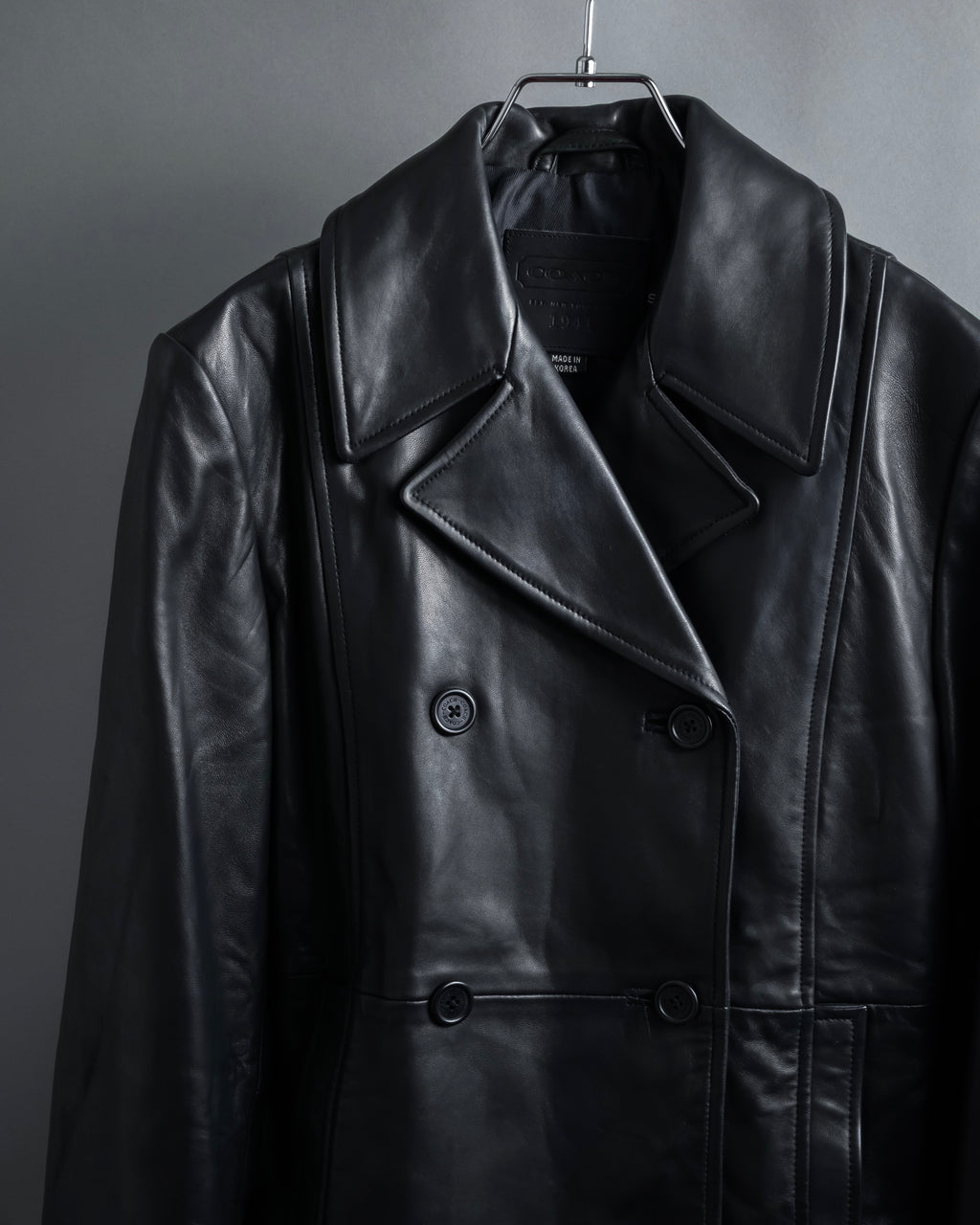 "COACH" Double-breasted panel work design leather coat