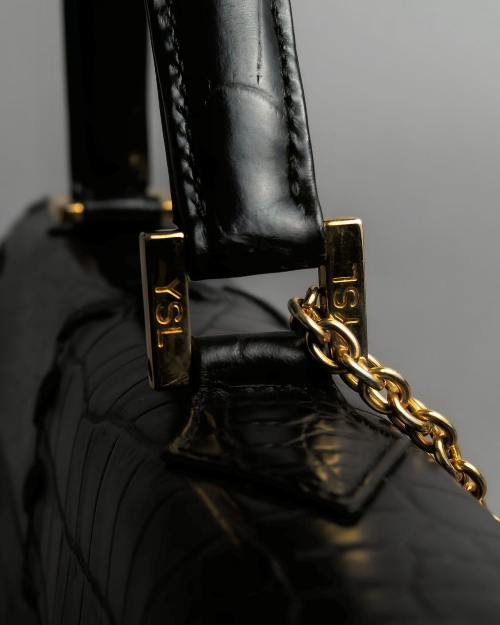 "YVES SAINT LAURENT" Whip stitch design crocodile foil stamped leather hand bag