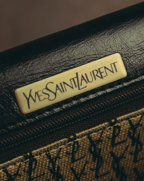 “Yves Saint Laurent” 70’s-80’s Perforated logo leather tassel shoulder bag
