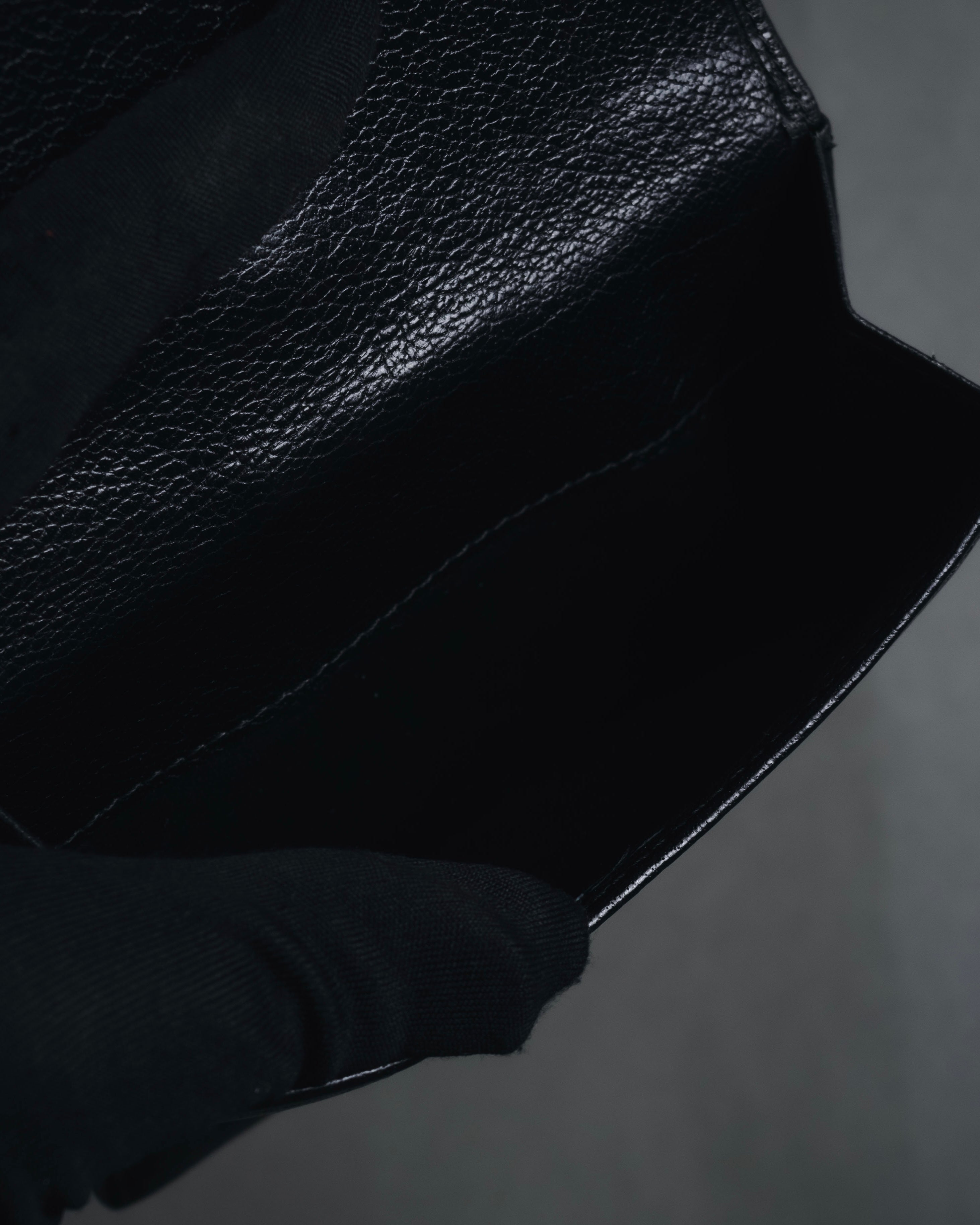 "YVES SAINT LAURENT" Stud-embellished monogram bi-fold wallet