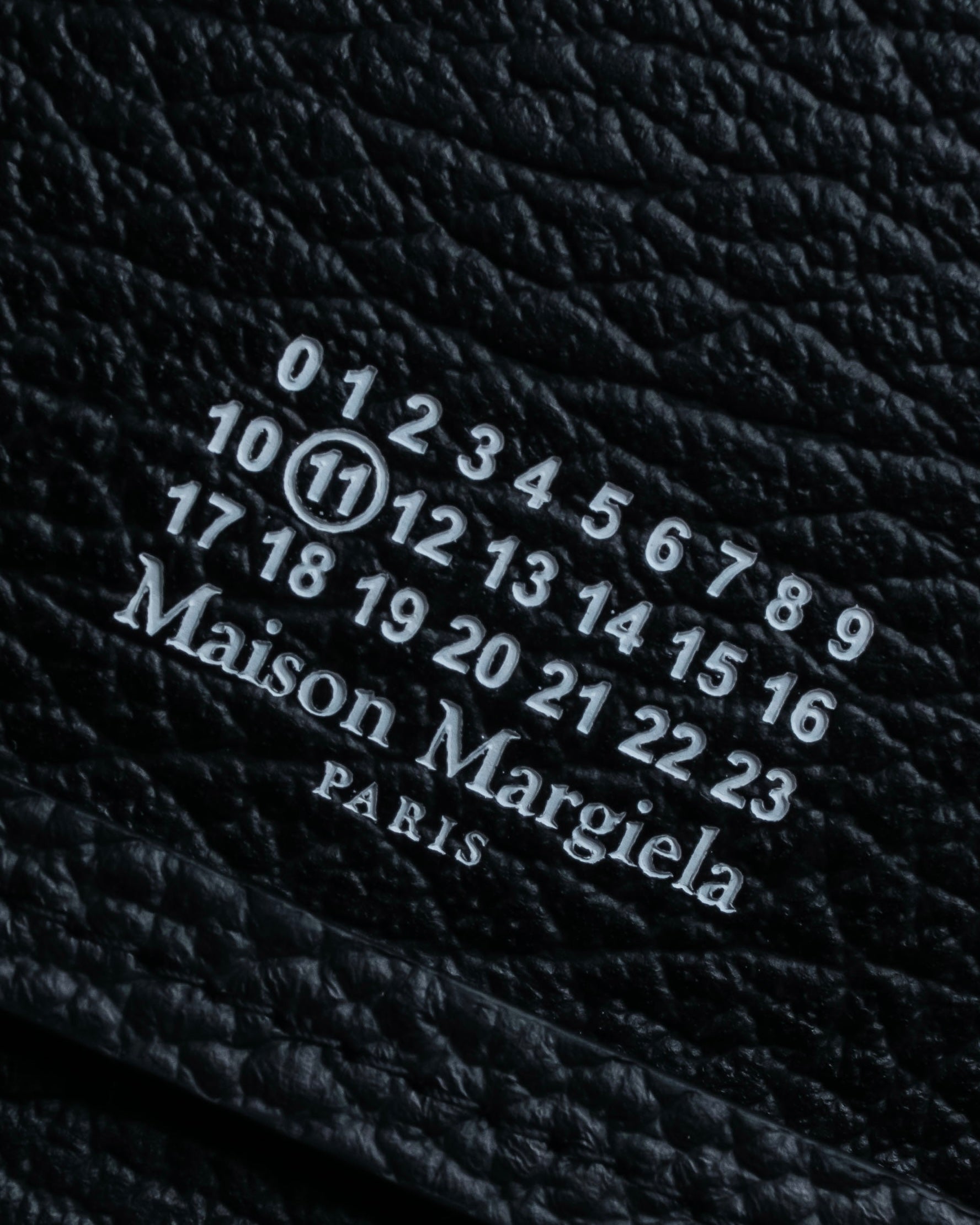 "MAISON MARGIELA" Grained leather chain wallet bag