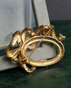 "Christian Dior" Oval ribbon motif gold brooch
