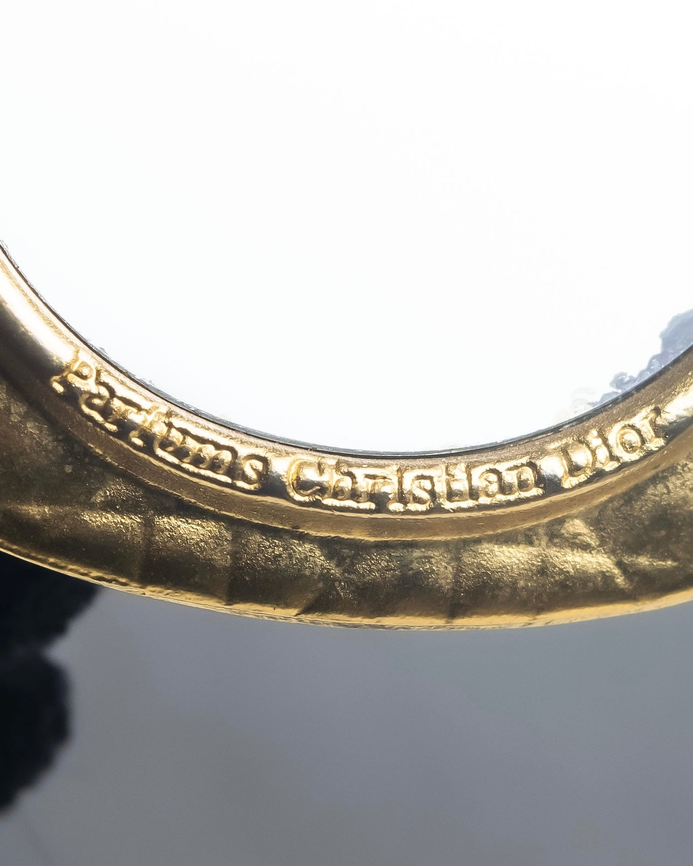 "Christian Dior" Cannage pattern engraved gold hand mirror