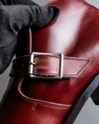 "tricot COMME des GARCONS"
 Belted heel leather pumps