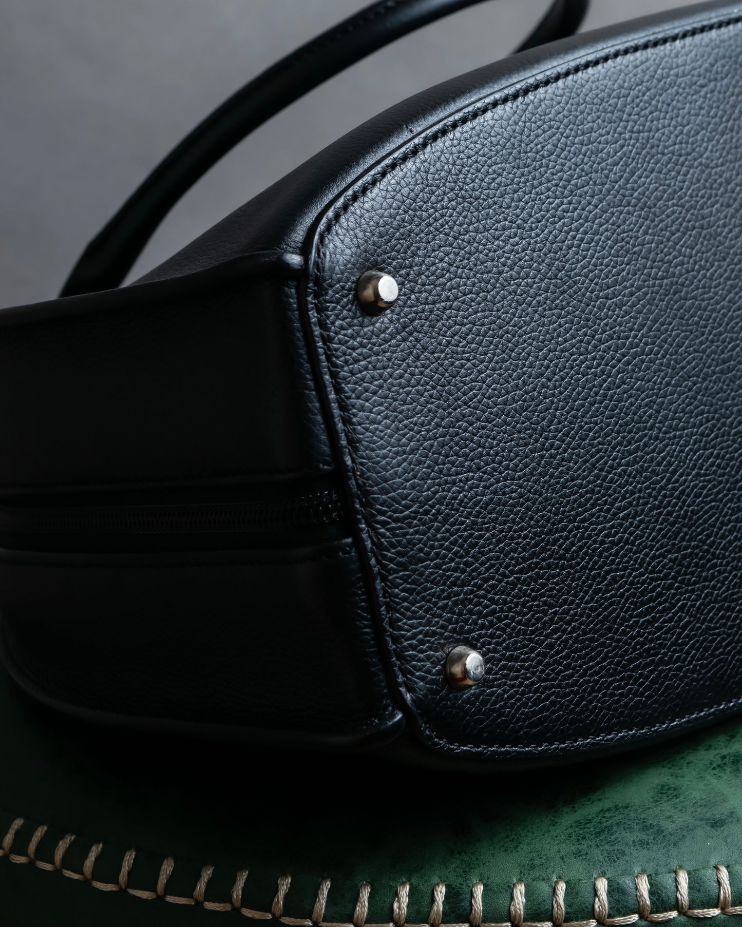 "MORABITO" Half moon design grained leather handbag