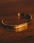 "Daniel Wellington" 20's Sleek gold cuff bracelet