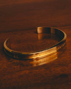 "Daniel Wellington" 20's Sleek gold cuff bracelet