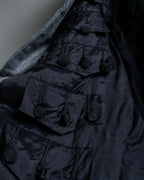 "Comme des Garçons" tailored jacket with stand collar and multiple pockets