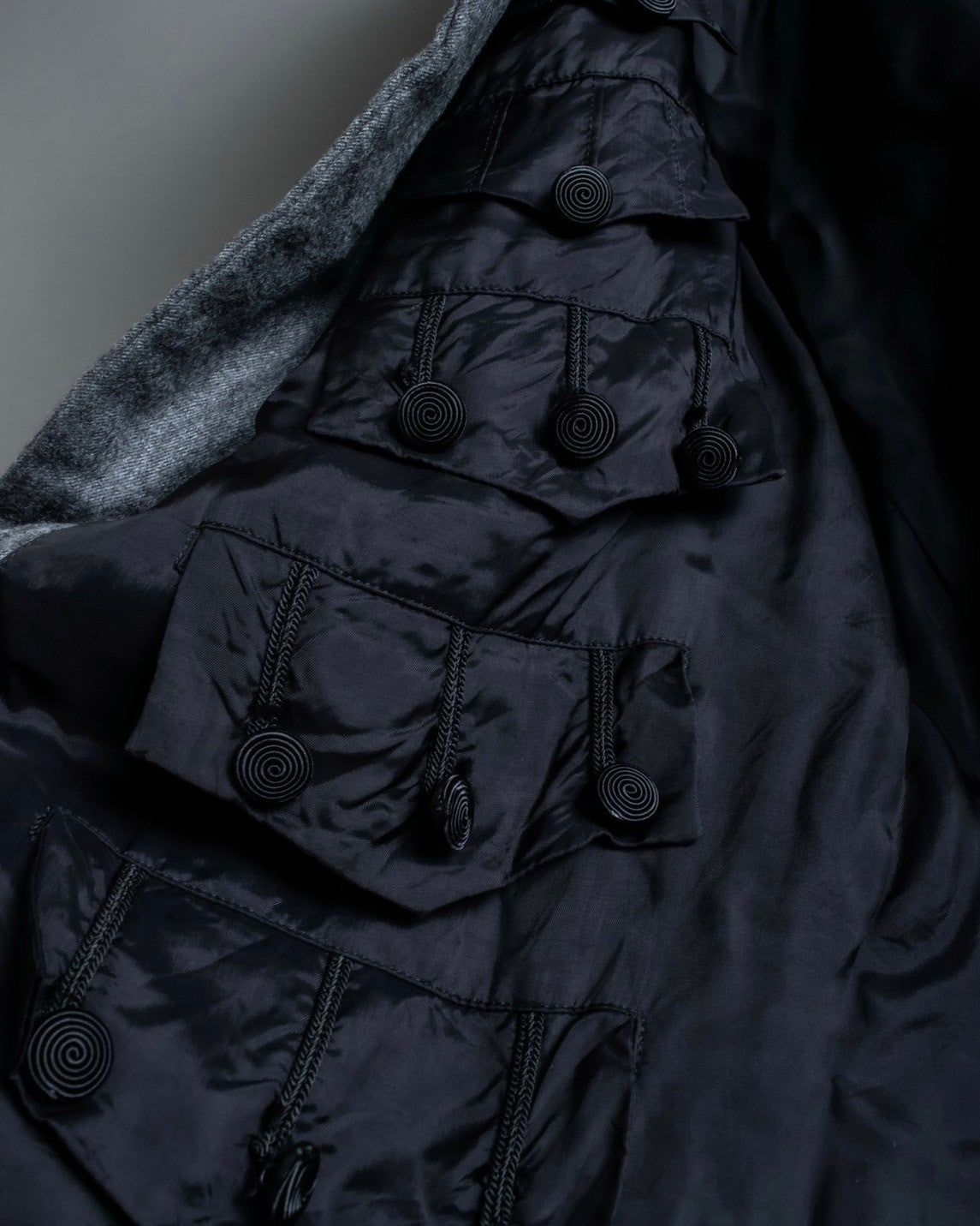 "Comme des Garçons" tailored jacket with stand collar and multiple pockets