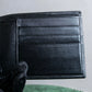 "Cartier" 2C logo engraved leather bi-fold wallet