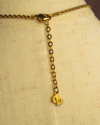 "Christian Dior" 80's-90's Gold tone bottle pendant necklace