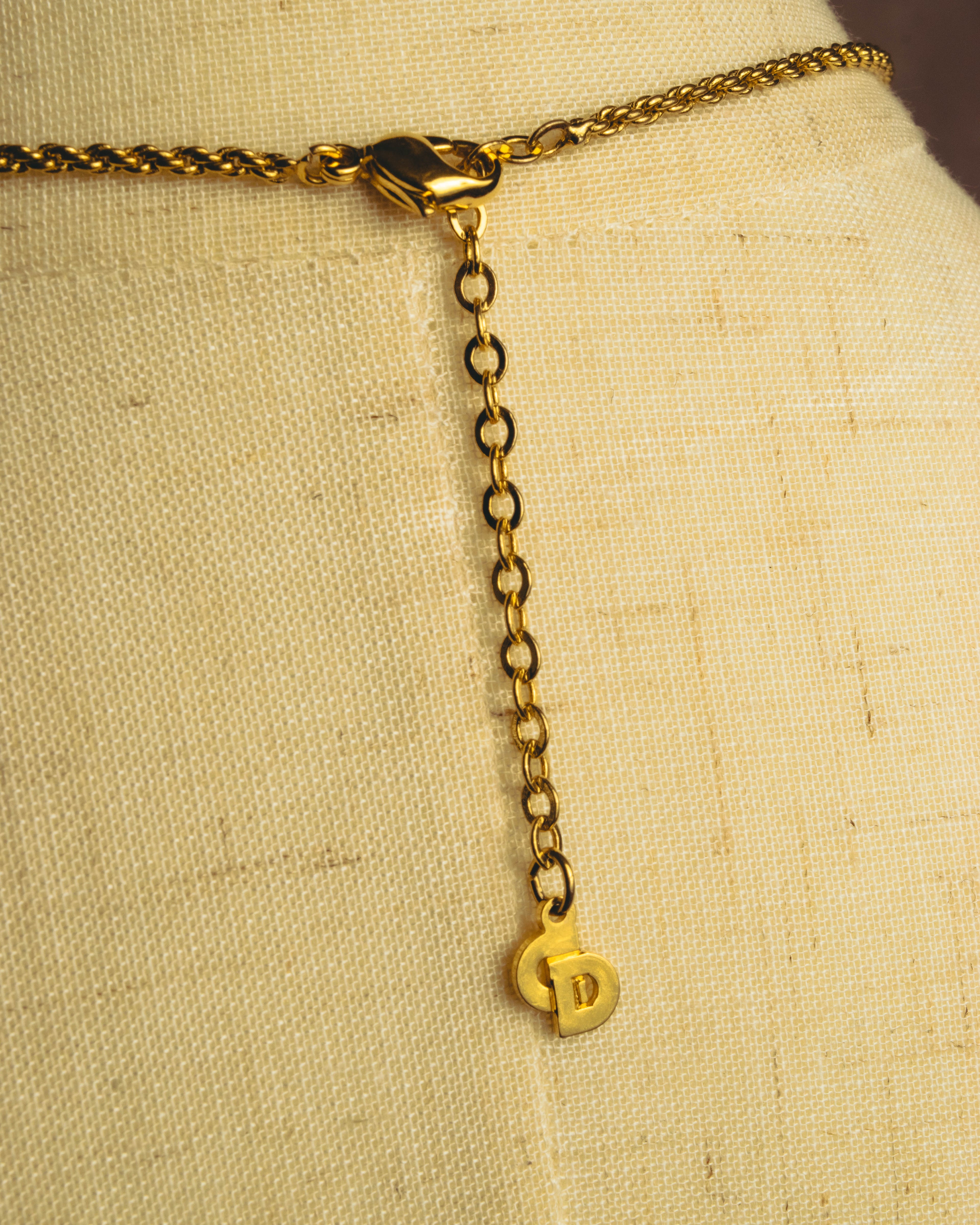 "Christian Dior" 80's-90's Gold tone bottle pendant necklace