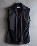 "Yves Saint Laurent Rive Gauche"
Twisted front sleeveless shirt