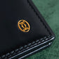 "Cartier" 2C logo engraved leather bi-fold wallet