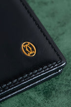 "Cartier" 2C logo engraved leather bi-fold wallet