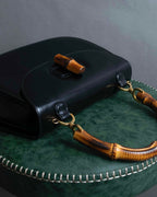 "GUCCI" Black leather bamboo handbag
