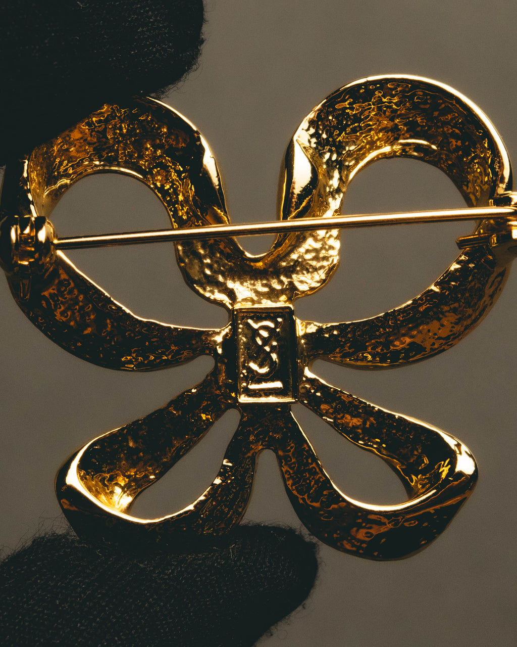 "Yves Saint Laurent" Sculptural gold bow brooch