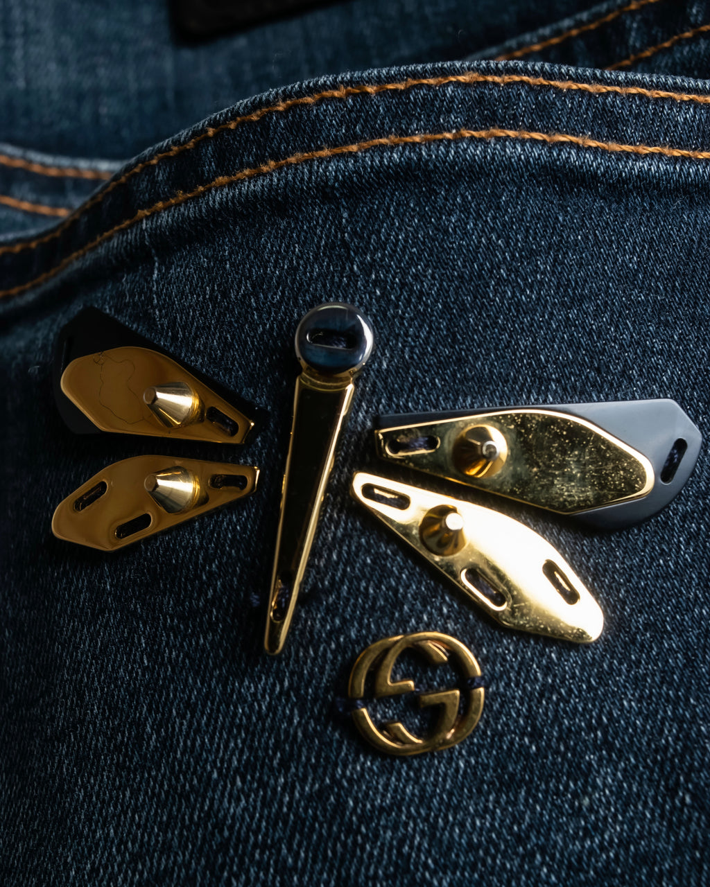 Pantalones de mezclilla con lavado de libélula de GUCCI