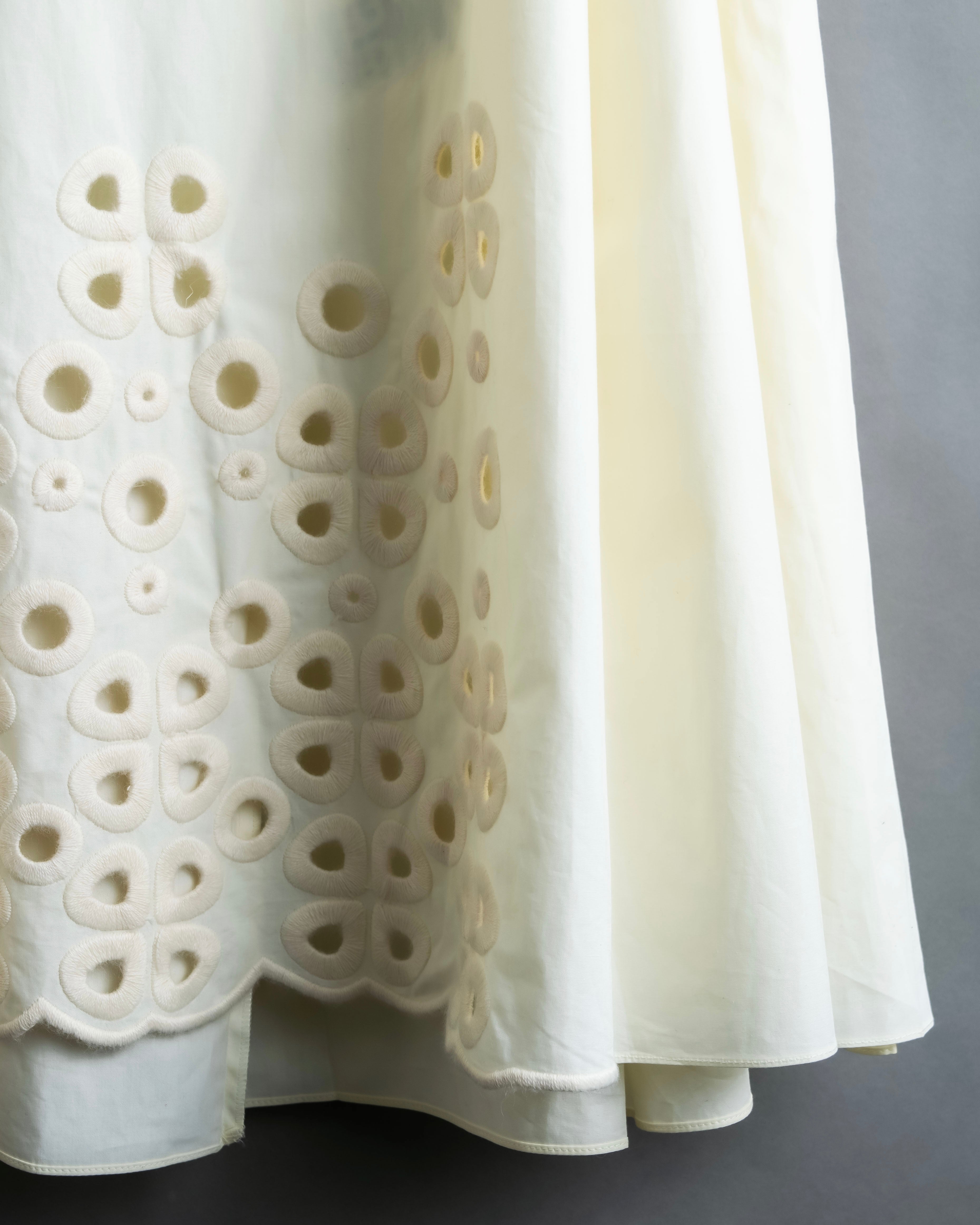 "FENDI" hole pattern and tack designed skirt