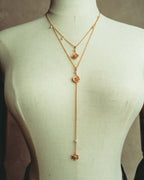 “Christian Dior” 2019-2025 Gold floral charm necklace with pearl accents