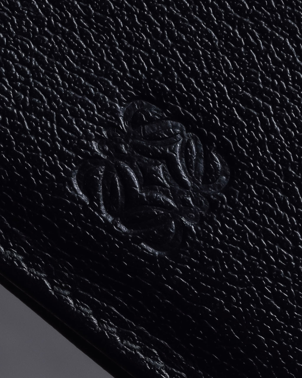 "LOEWE" Logo engraved bi-fold leather wallet