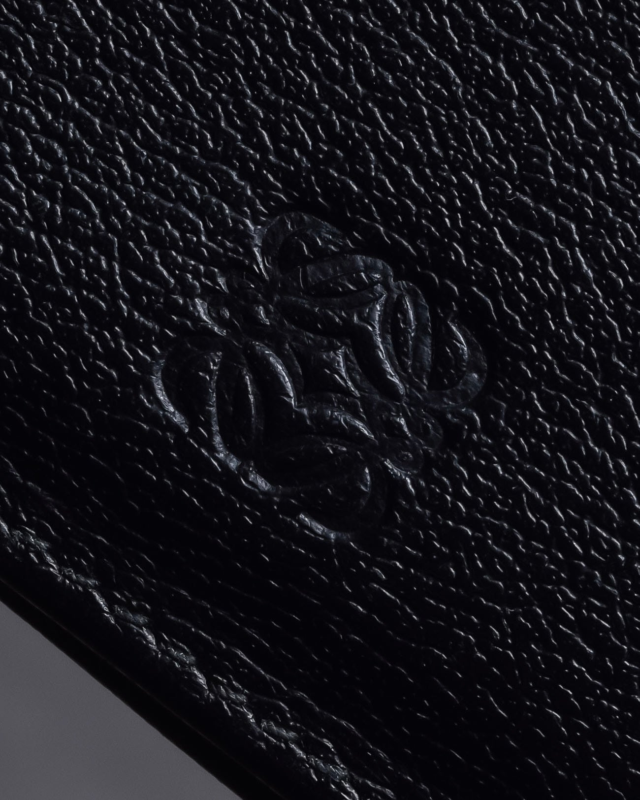 "LOEWE" Logo engraved bi-fold leather wallet