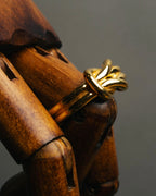 "HERMES" Sculptural gold tone knot Atame scarf ring