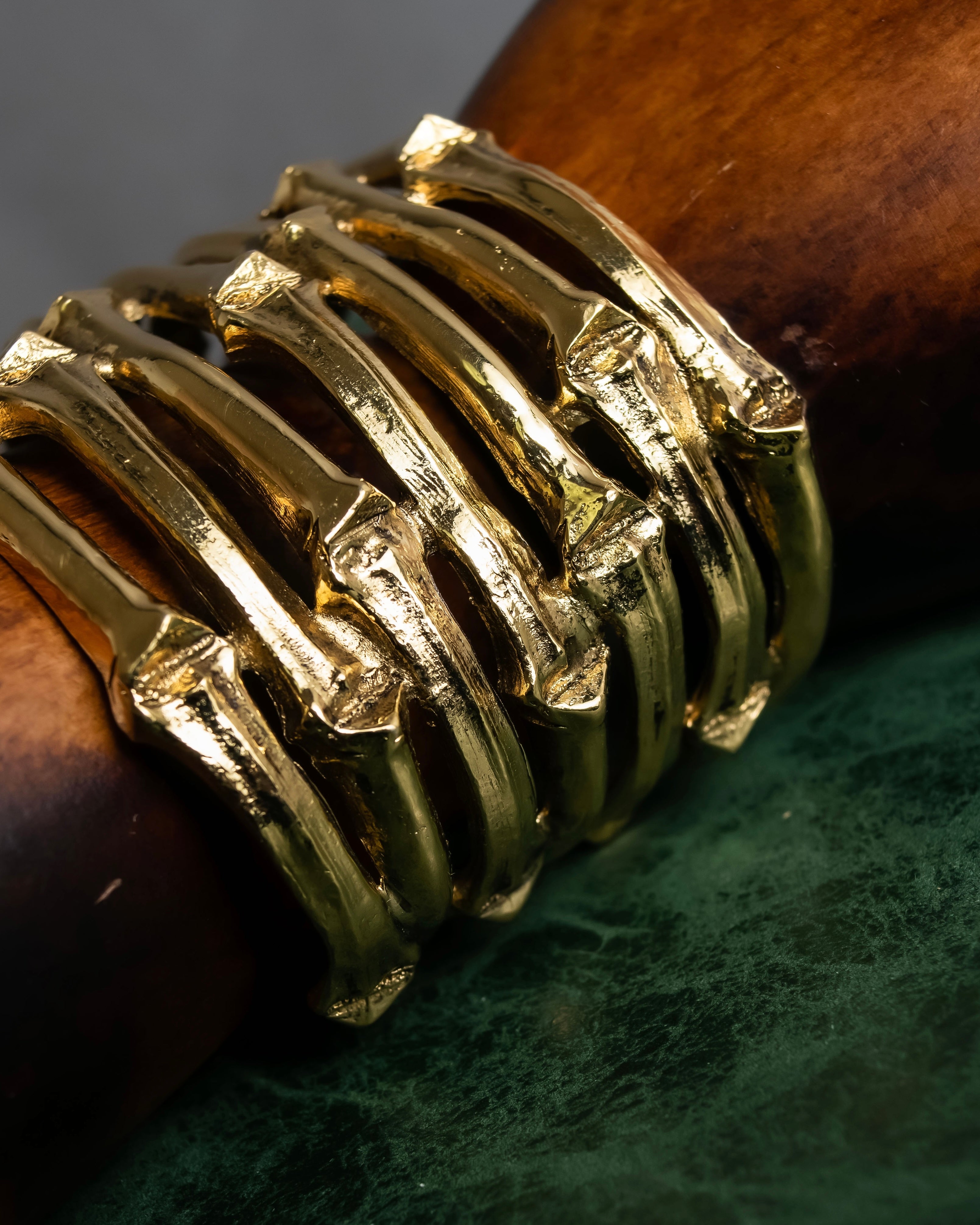 "YVES SAINT LAURENT" Skeletal arm shape design gold bangle