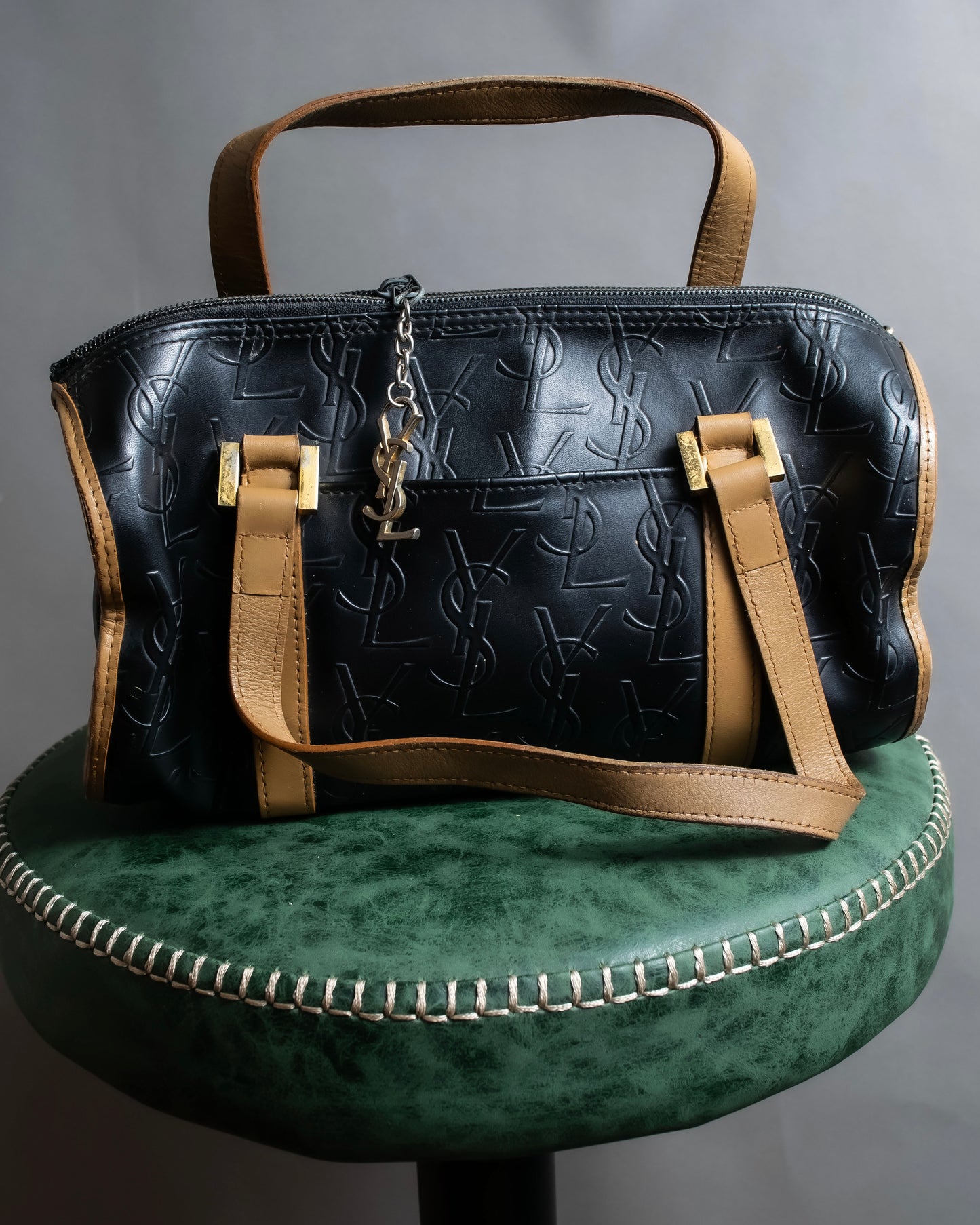 "YVES SAINT LAURENT" Logo engraved bicolor leather boston bag