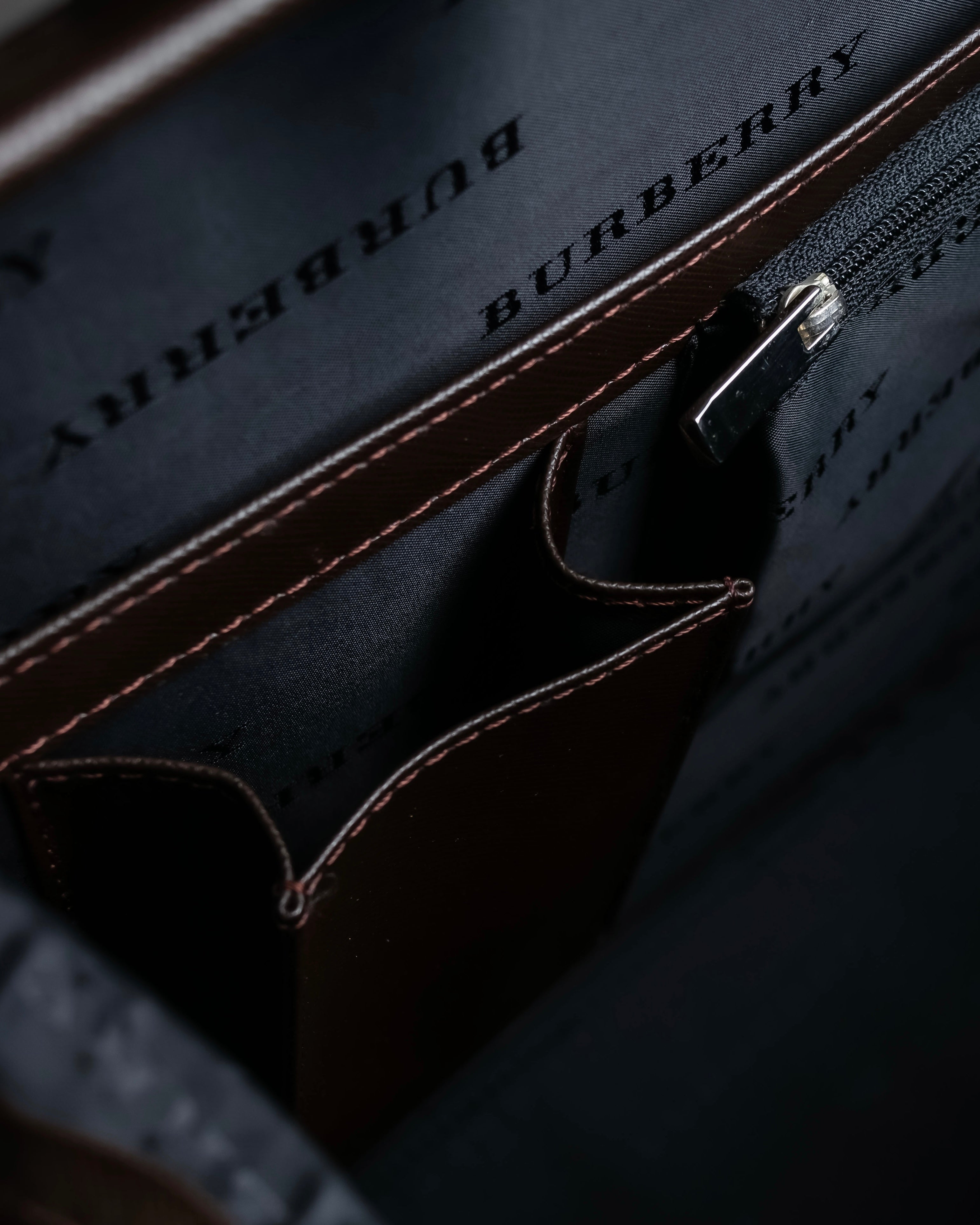 "BURBERRY" Metal belt design embossed PVC briefcase