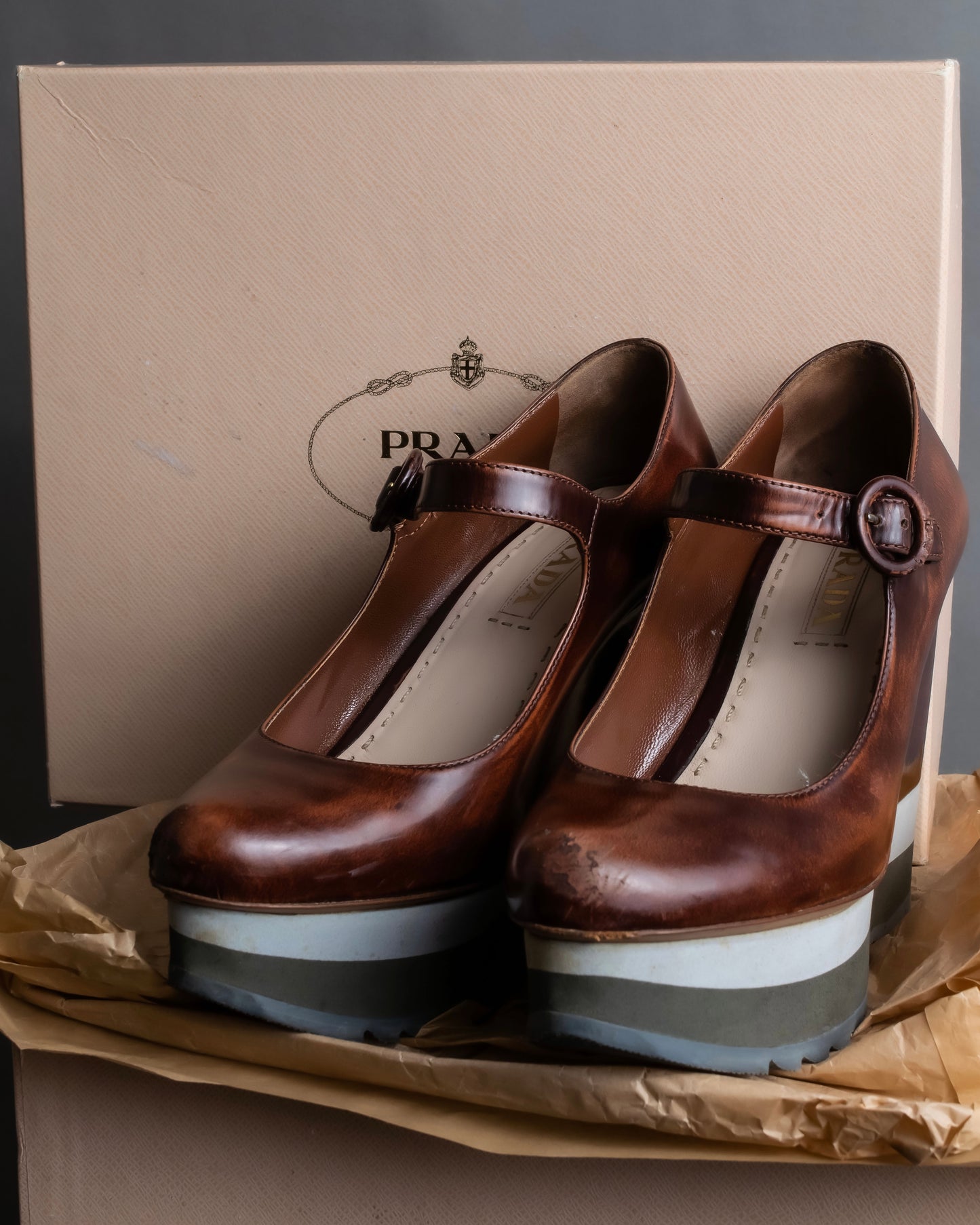 "PRADA" Brown leather stepped sole wedge heel pumps