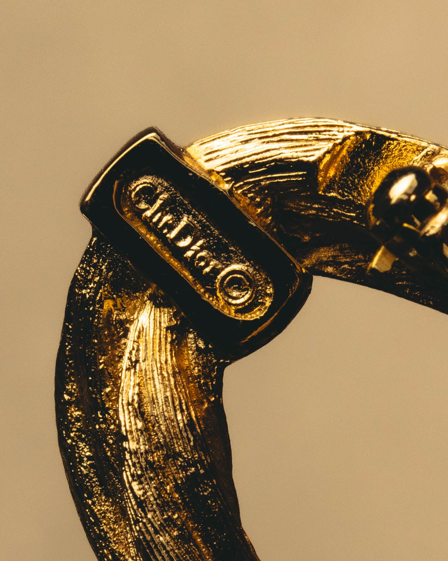 "Christian Dior" 70's Textured gold tone brooch