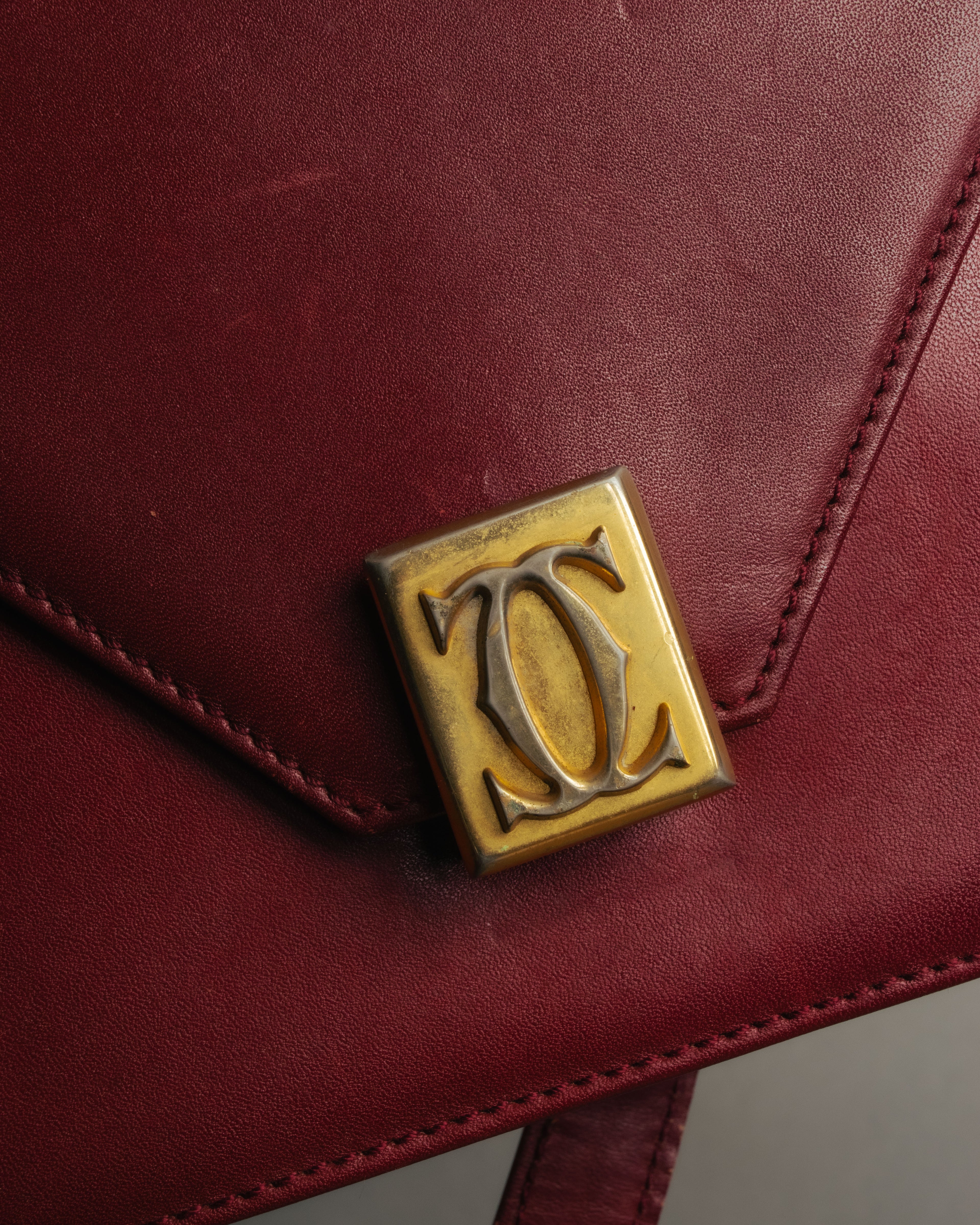 “Cartier” 80’s-90’s Must de Cartier burgundy leather shoulder bag