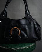 “Salvatore Ferragamo” 90’s-00’s wicker gancini leather handbag