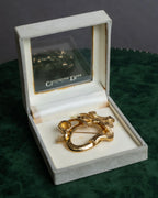 "Christian Dior" Oval ribbon motif gold brooch