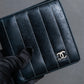 "CHANEL" Mademoiselle line design coco mark engraved bi fold wallet