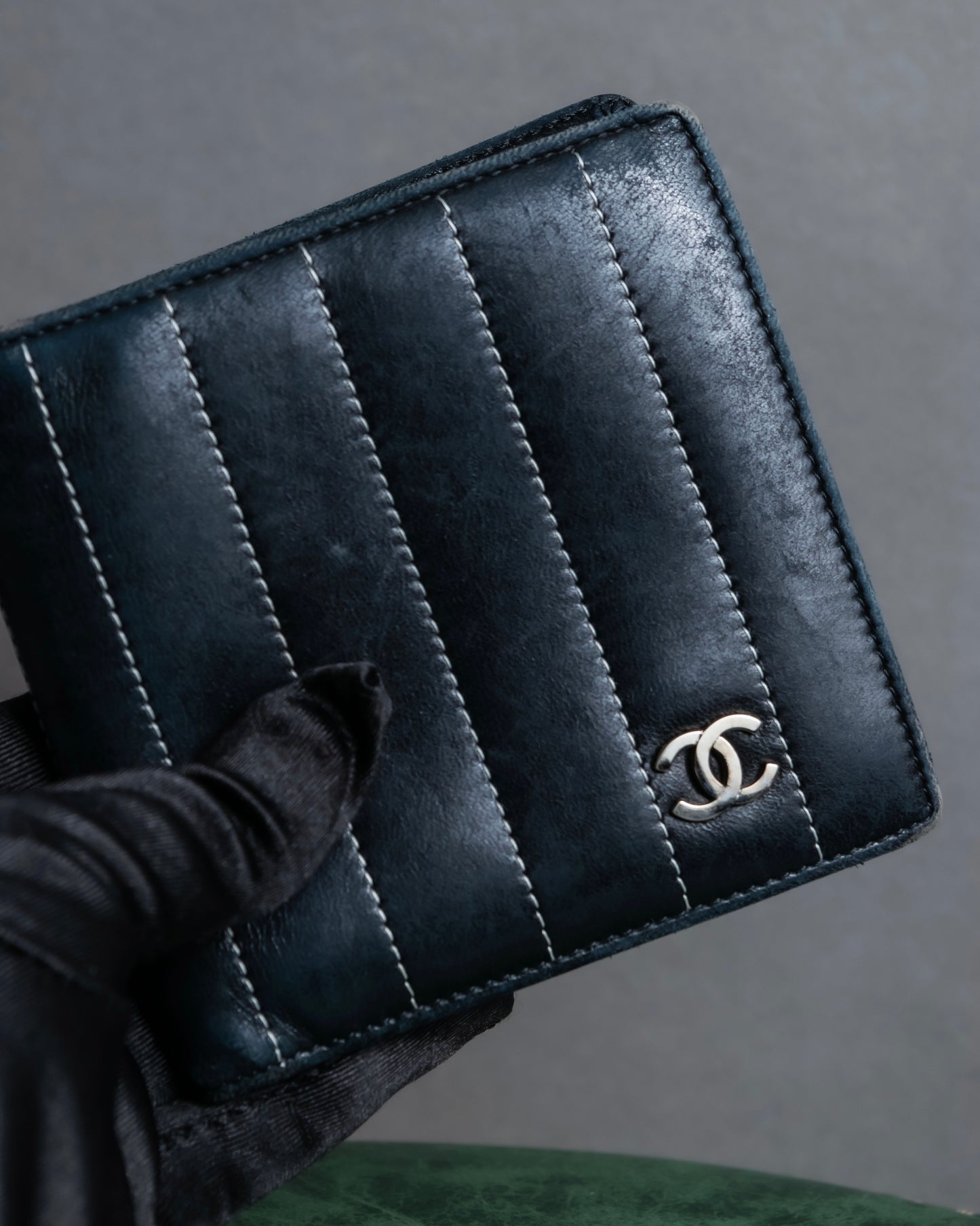 "CHANEL" Mademoiselle line design coco mark engraved bi fold wallet