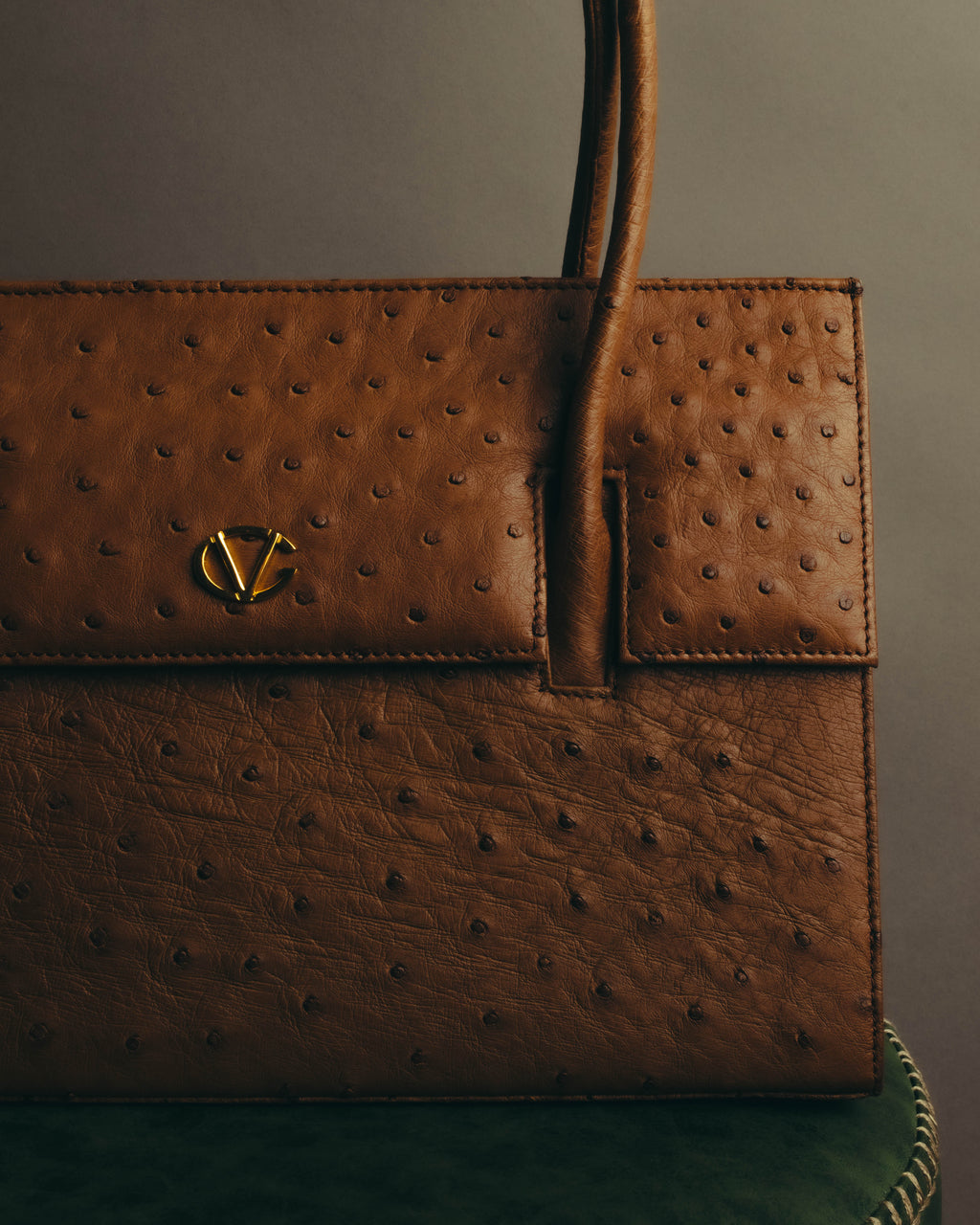 “GIOVANNI VALENTINO” Structured ostrich top handle bag