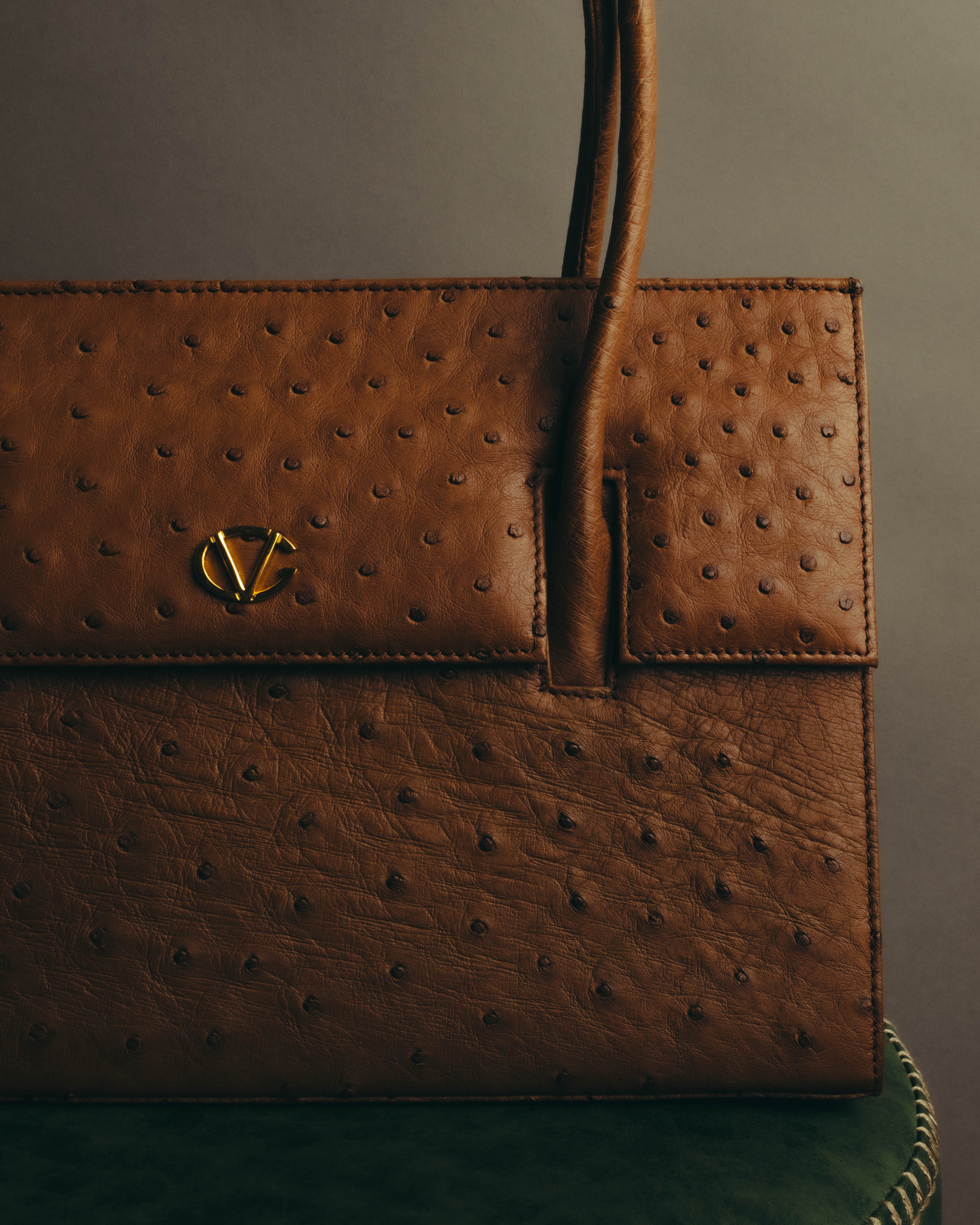 “GIOVANNI VALENTINO” Structured ostrich top handle bag